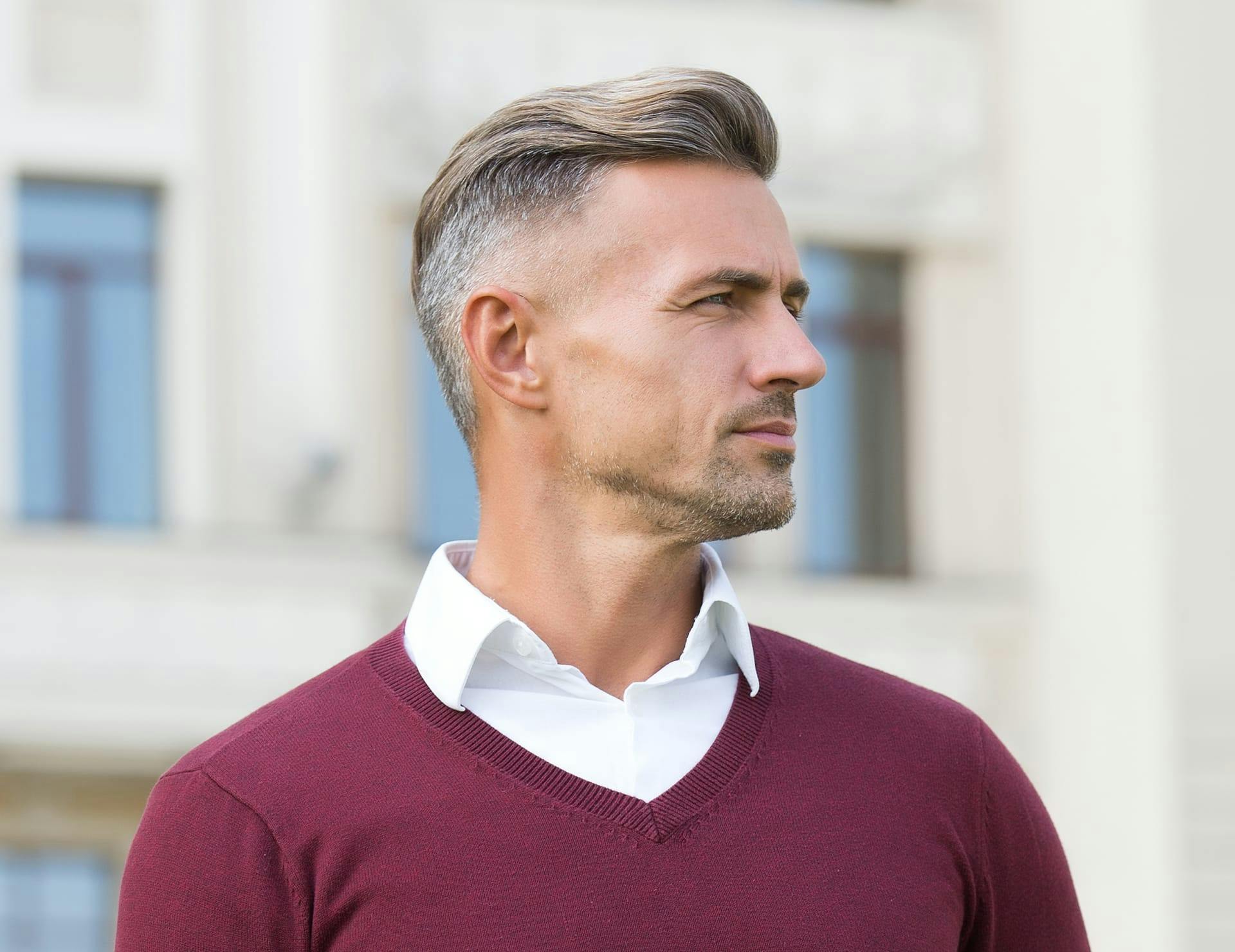 A man with full hair after a hair transplant in Fort Myers.