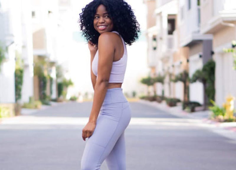 woman in purple workout gear
