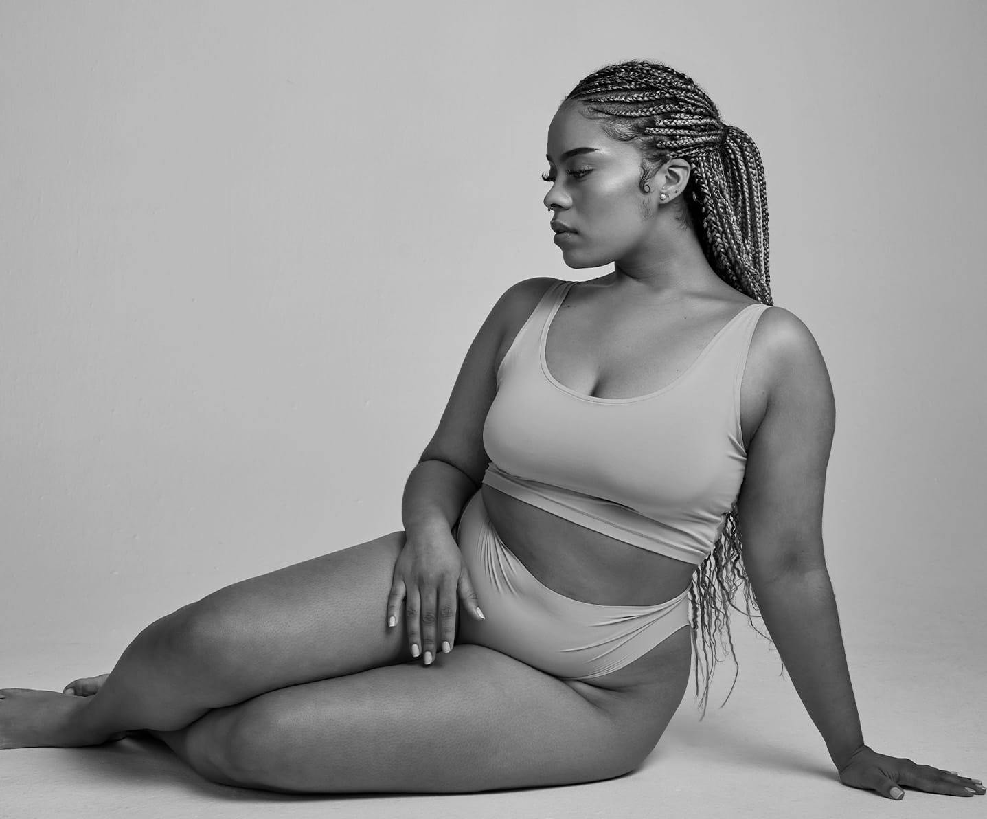 woman sitting on the ground