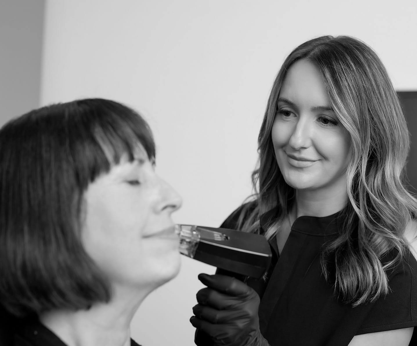 woman receiving laser treatment