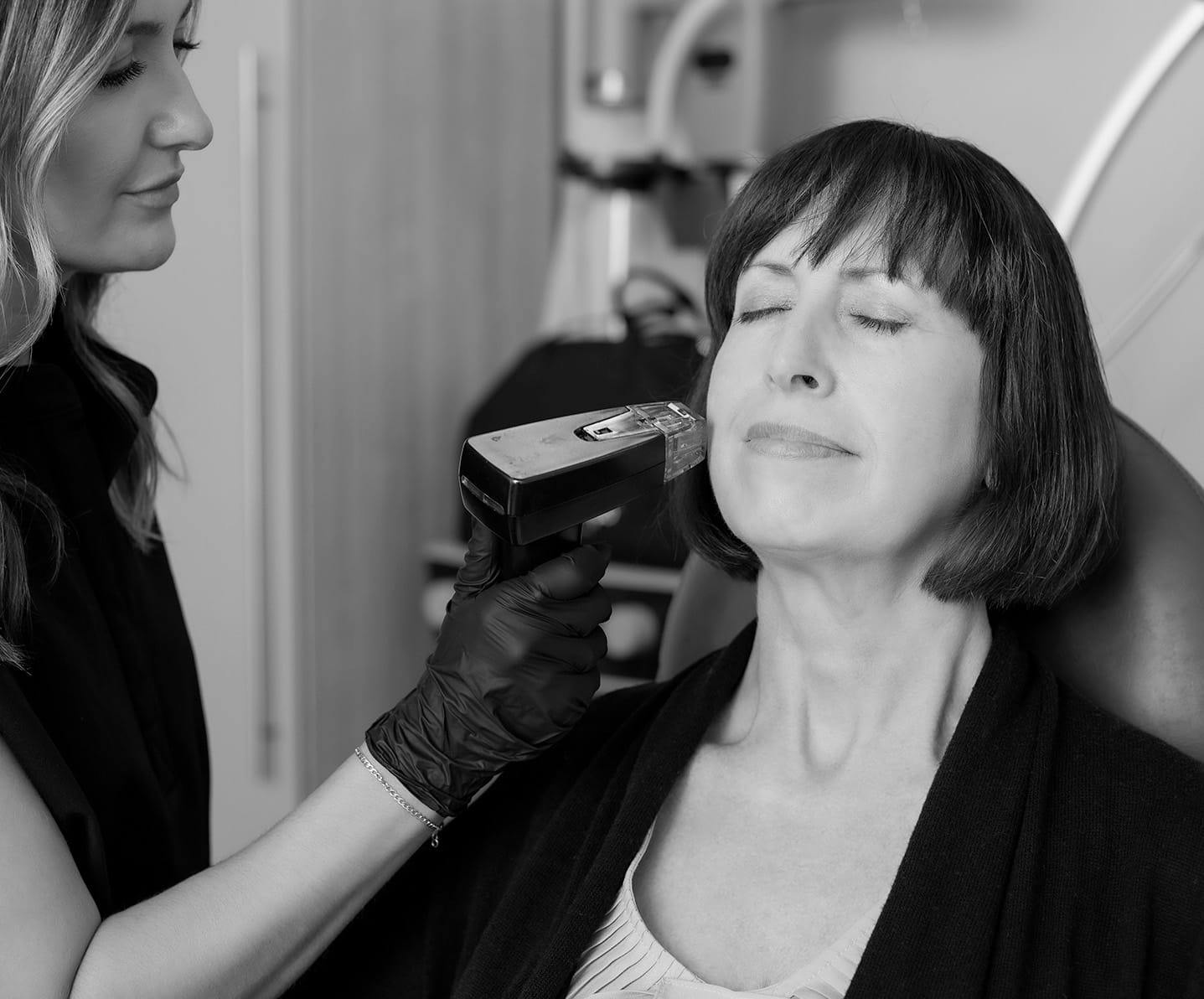 woman receiving laser treatment
