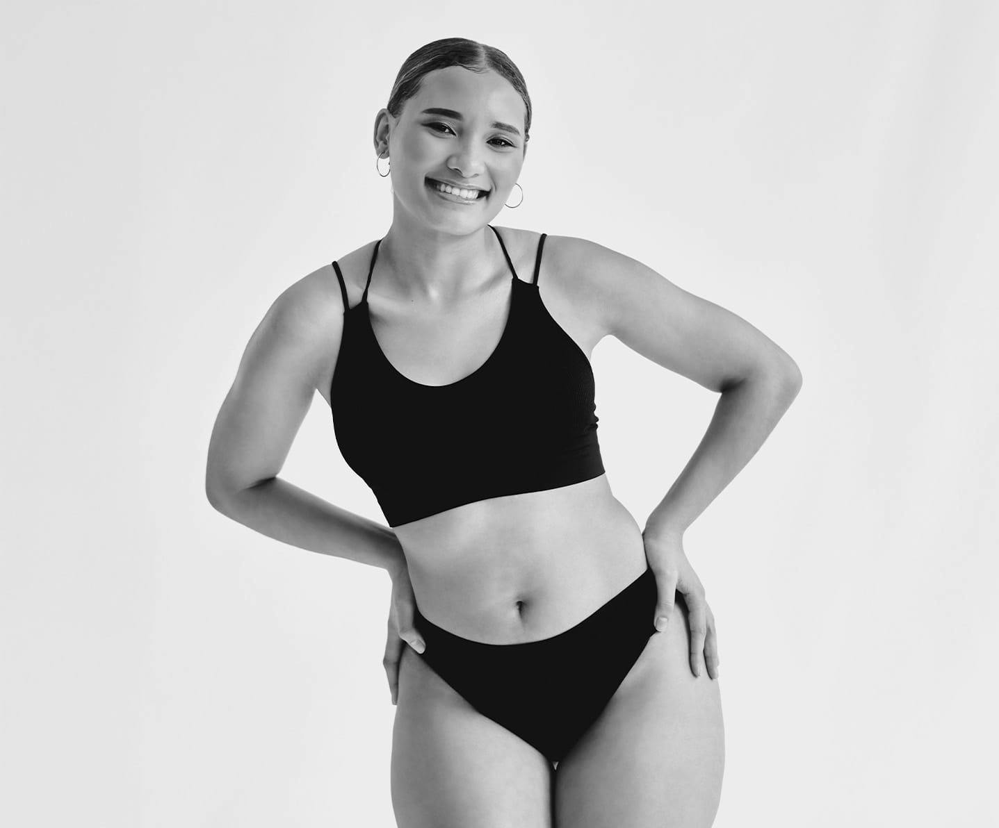 woman in underwear with hands on her hips