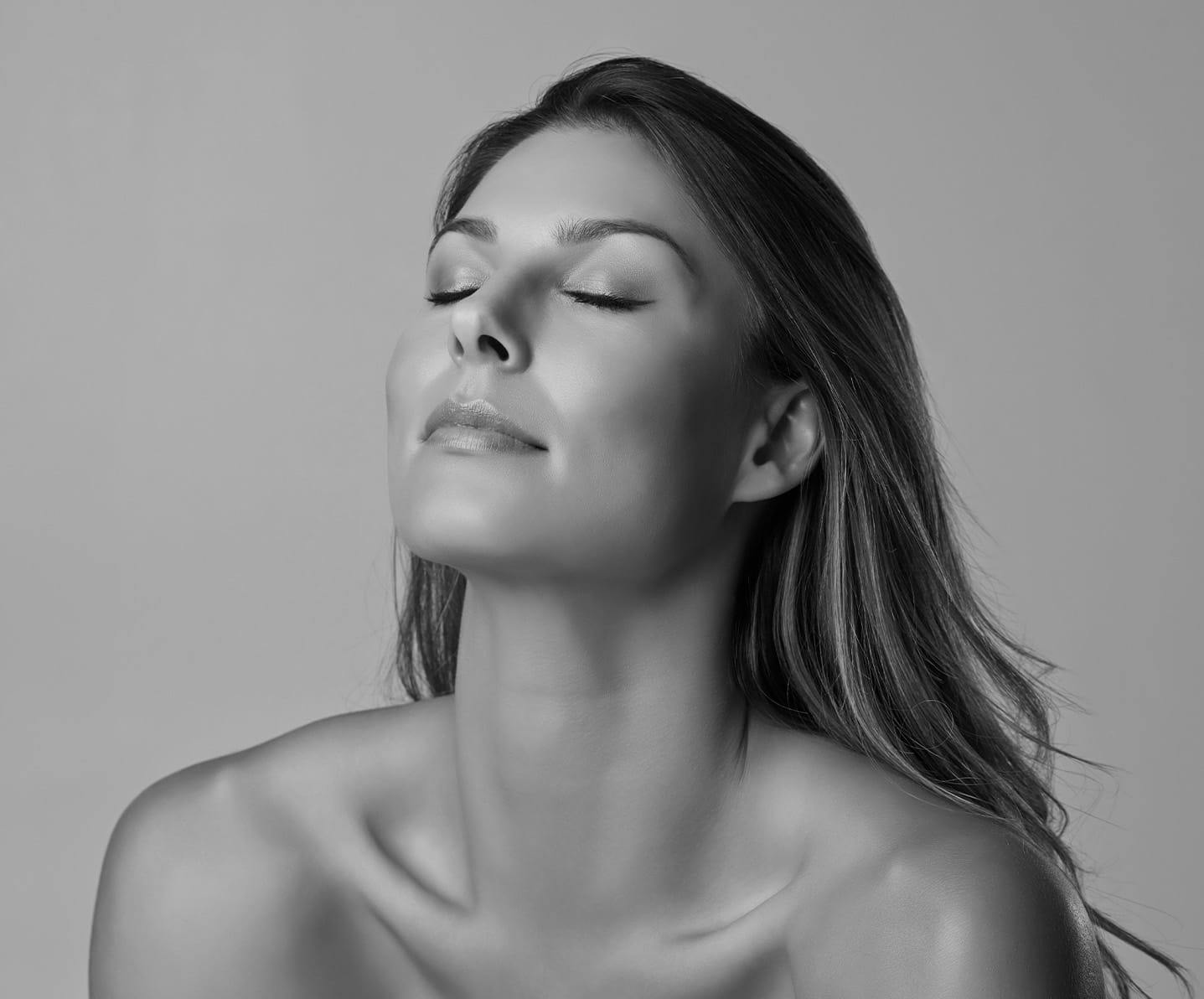 woman wither her eyes closed