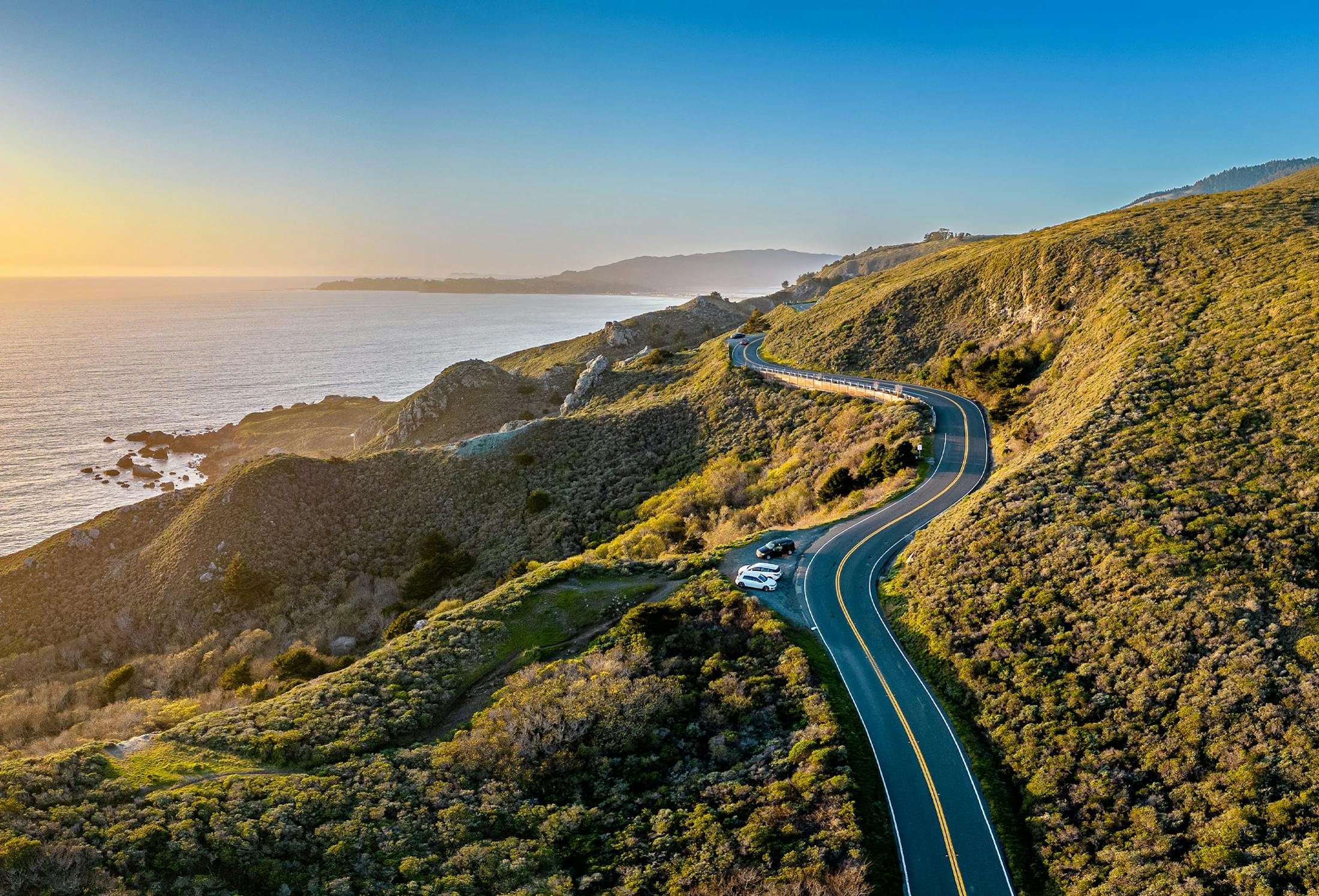 street through hills by the ocean