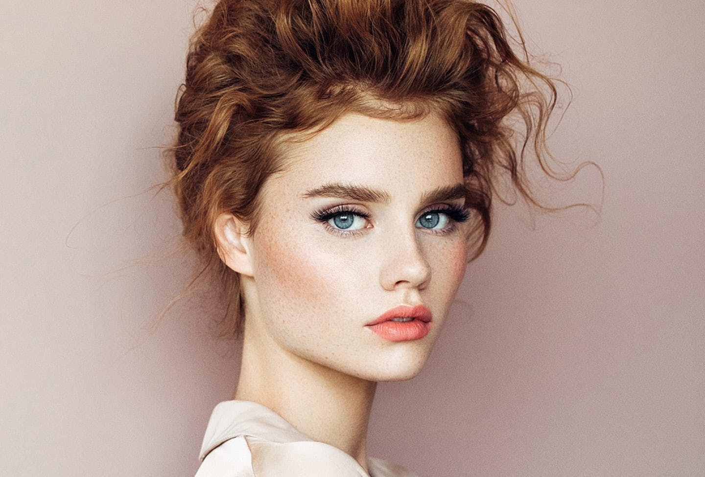 Model pouting her lips while looking over her shoulder