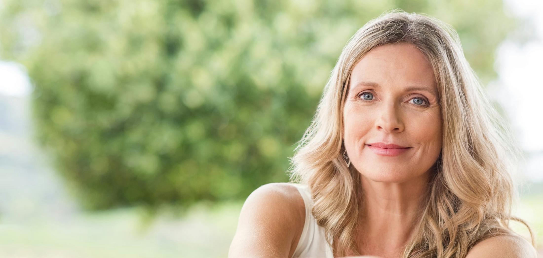 Woman with Greenery in the Background