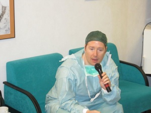 Dr. Waring speaking in a microphone