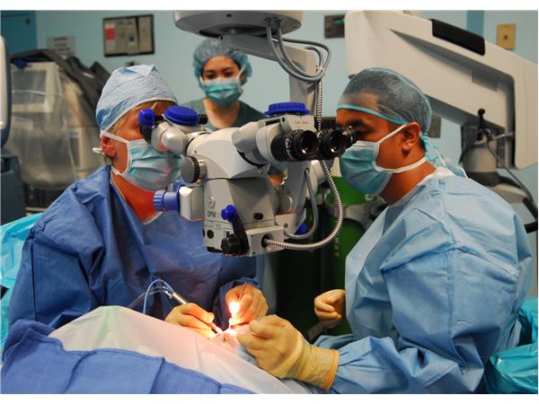 waring vision team performing eye surgery
