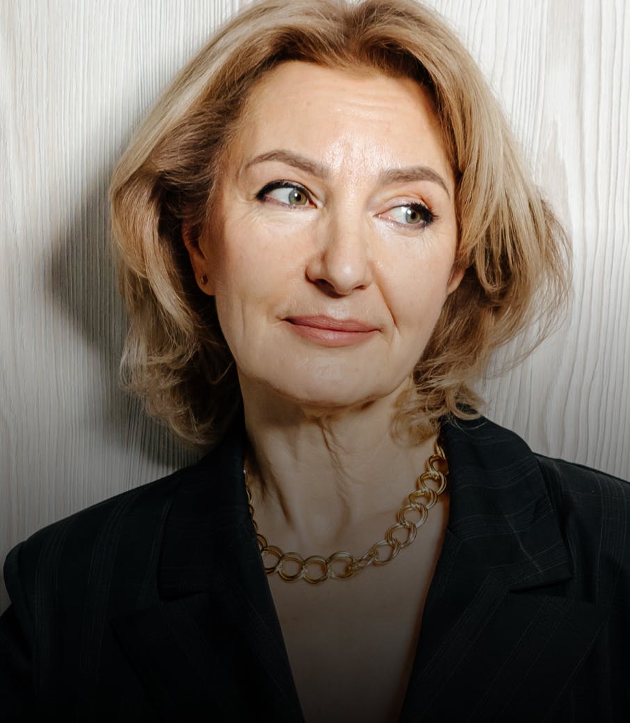 Woman smiling looking off to the side