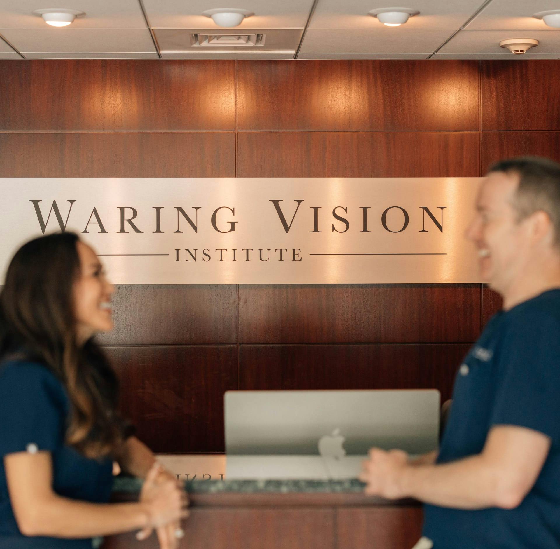 Doctors standing at the front desk