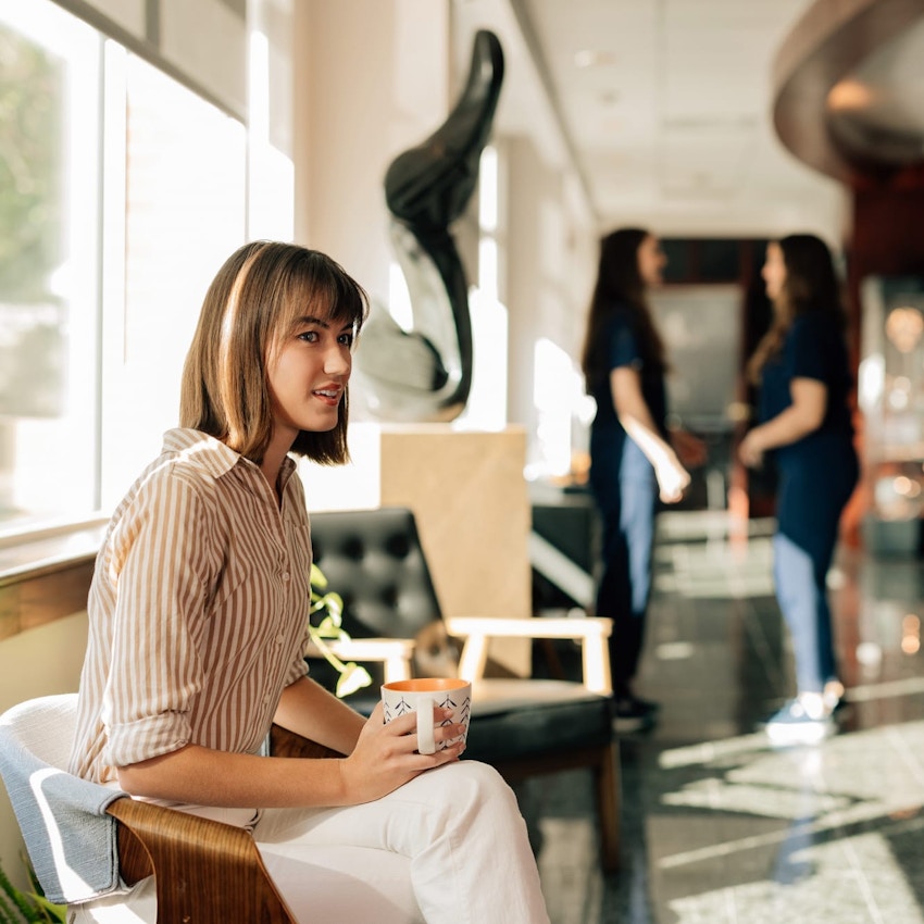 Woman sitting in a coffee shop