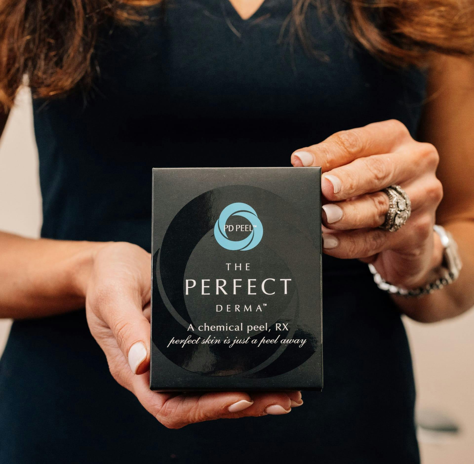 Woman holding the perfect peel