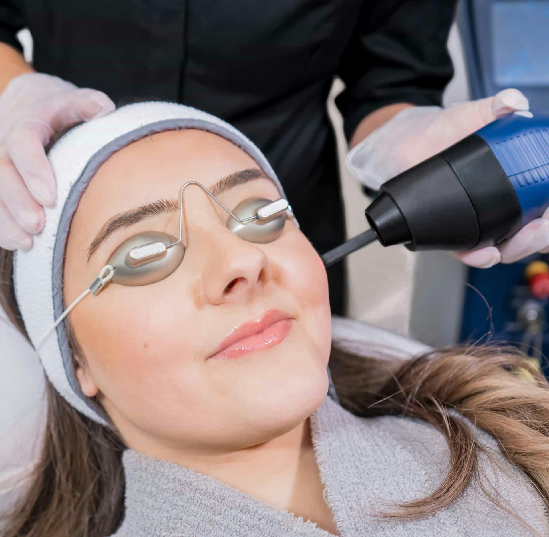 Woman smiling during treatment