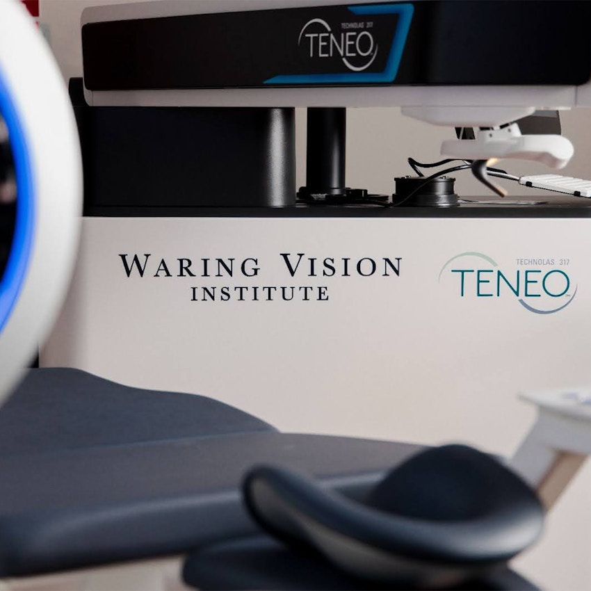 Woman layng under eye equipment