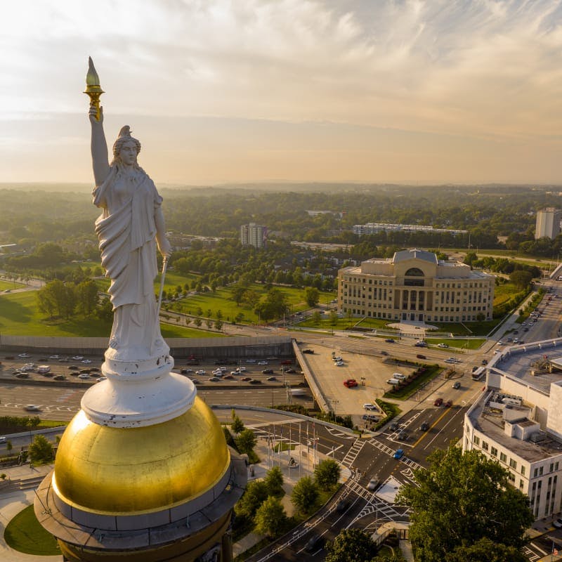 statue on the top of a building