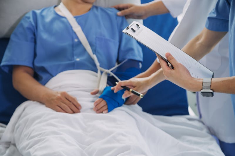 A person in a hospital bed