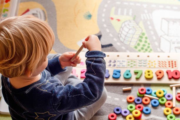 A child playing with toys