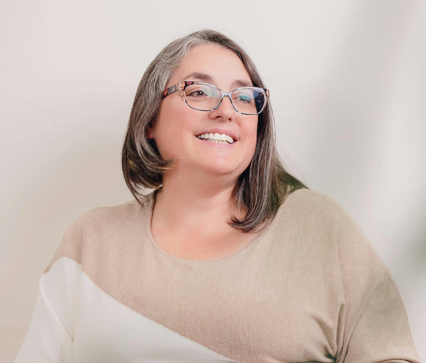 Woman looking to the side and smiling