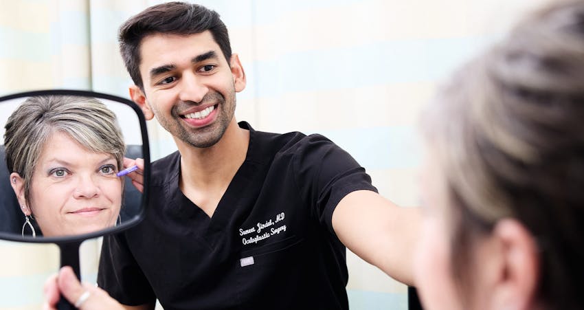 Patient looking into mirror
