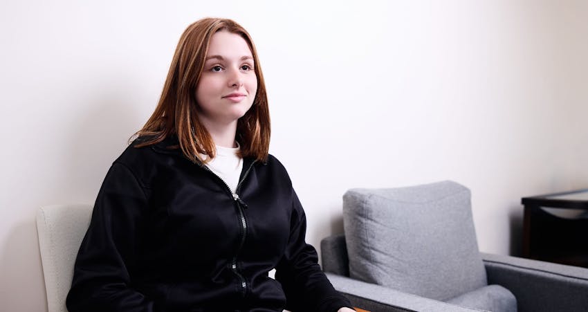 Woman smiling in the waiting room