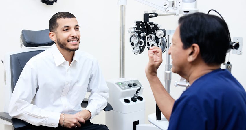 Man and doctor during eye exam