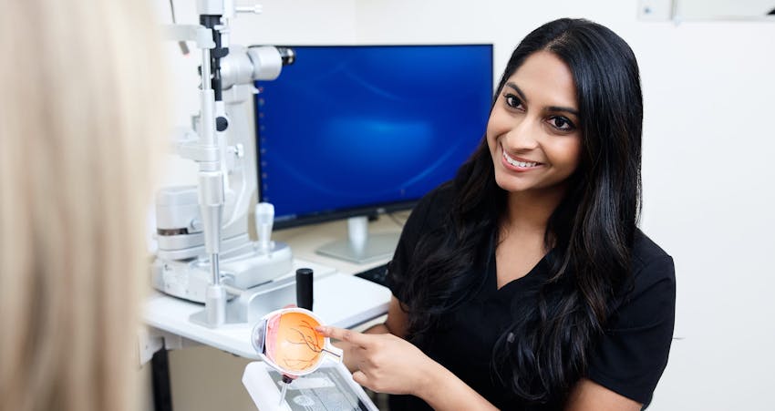 Doctor smiling at patient