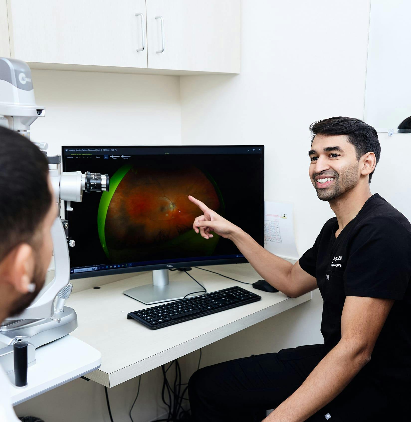 Doctor pointing to screen