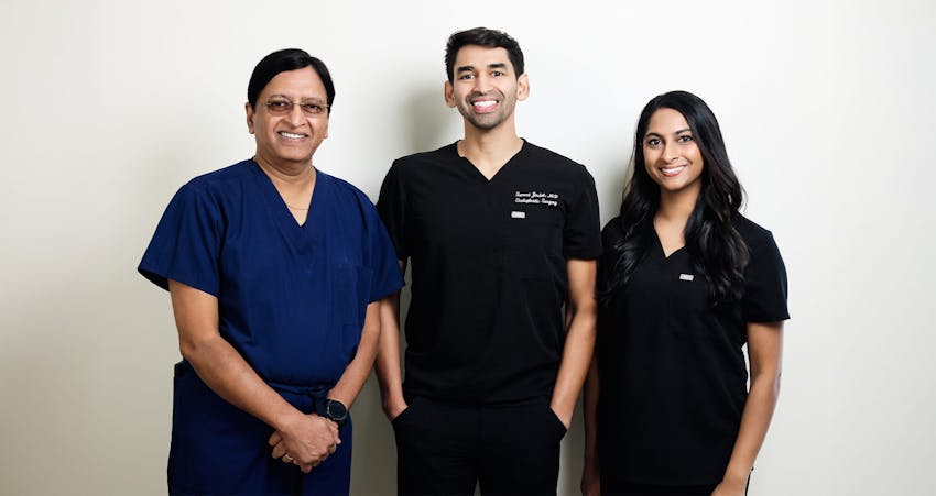 New Century team smiling