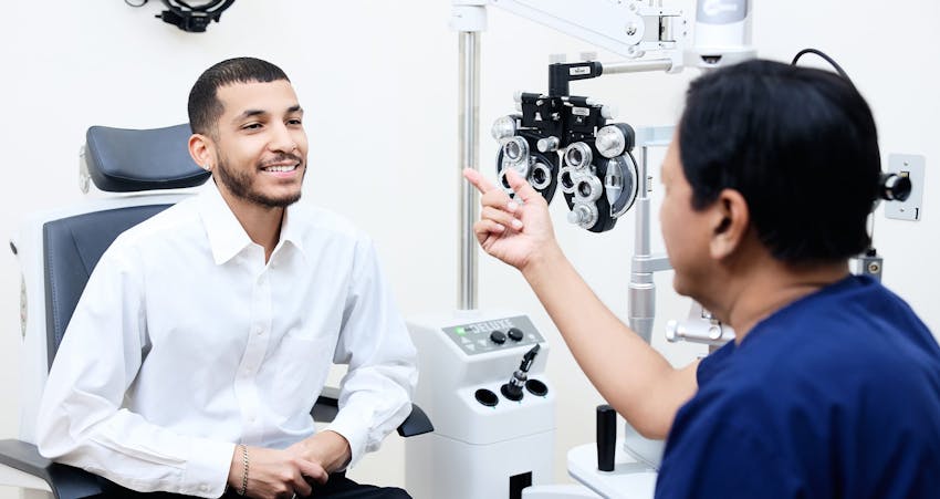Doctor and male patient during eye exam