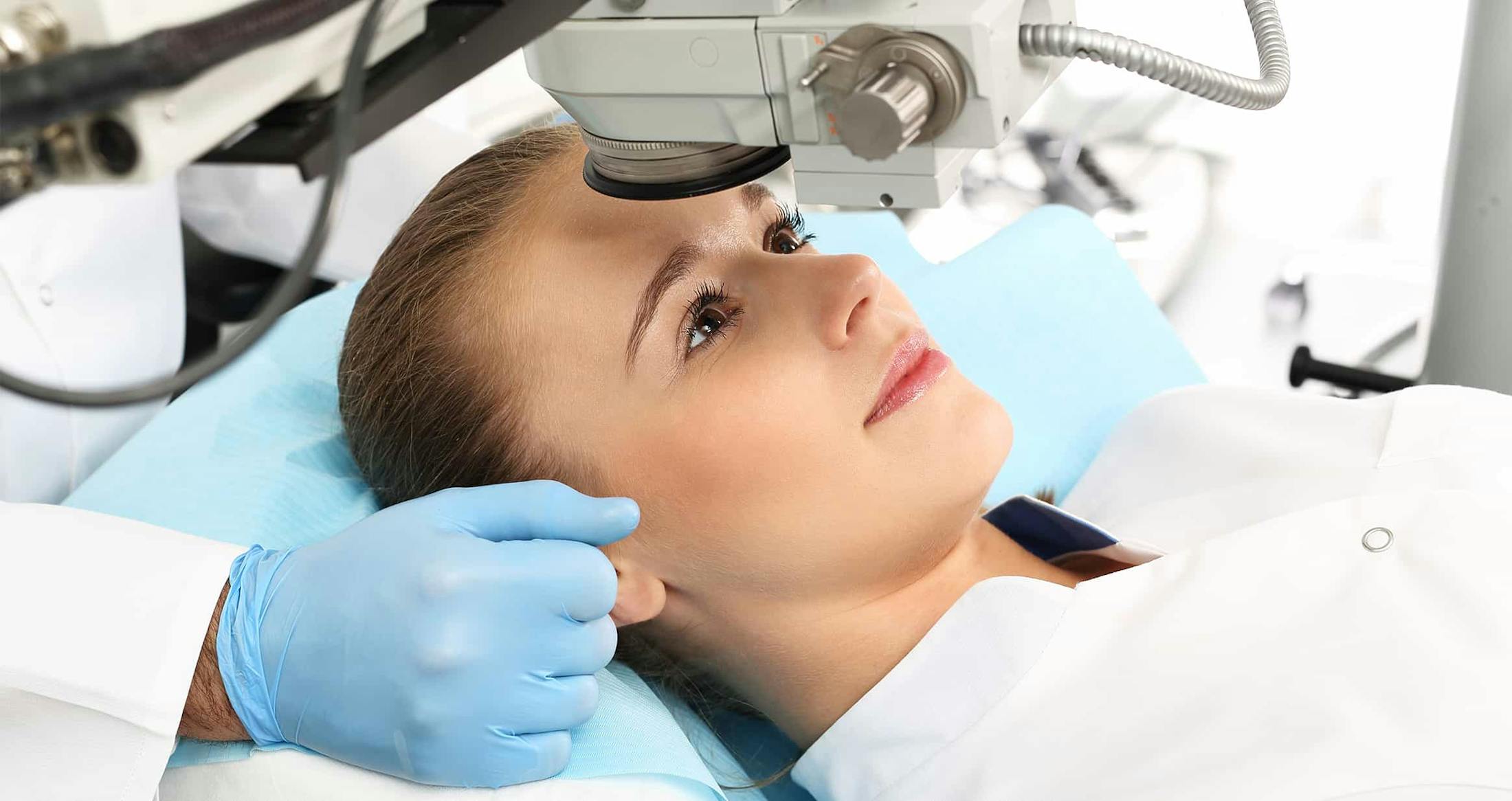 Woman layiing down under eye equipment