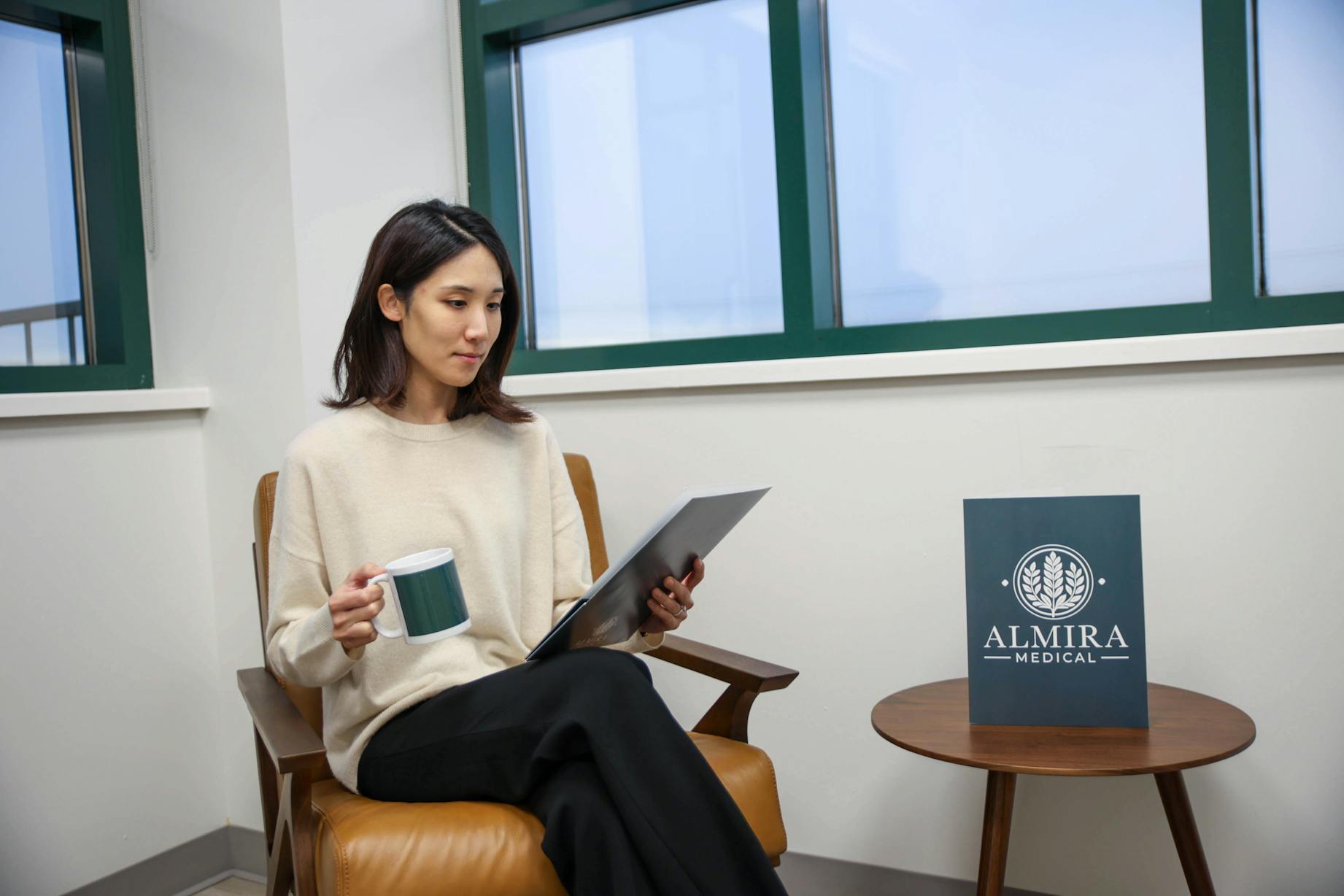 Patient relaxing in the private lounge area at Almira Medical
