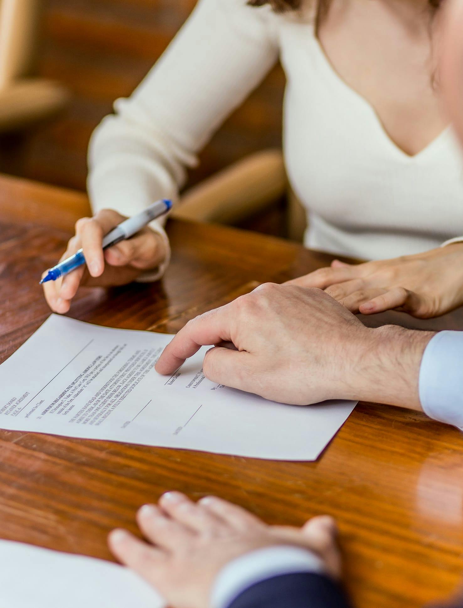 Attourney and client with paperwork