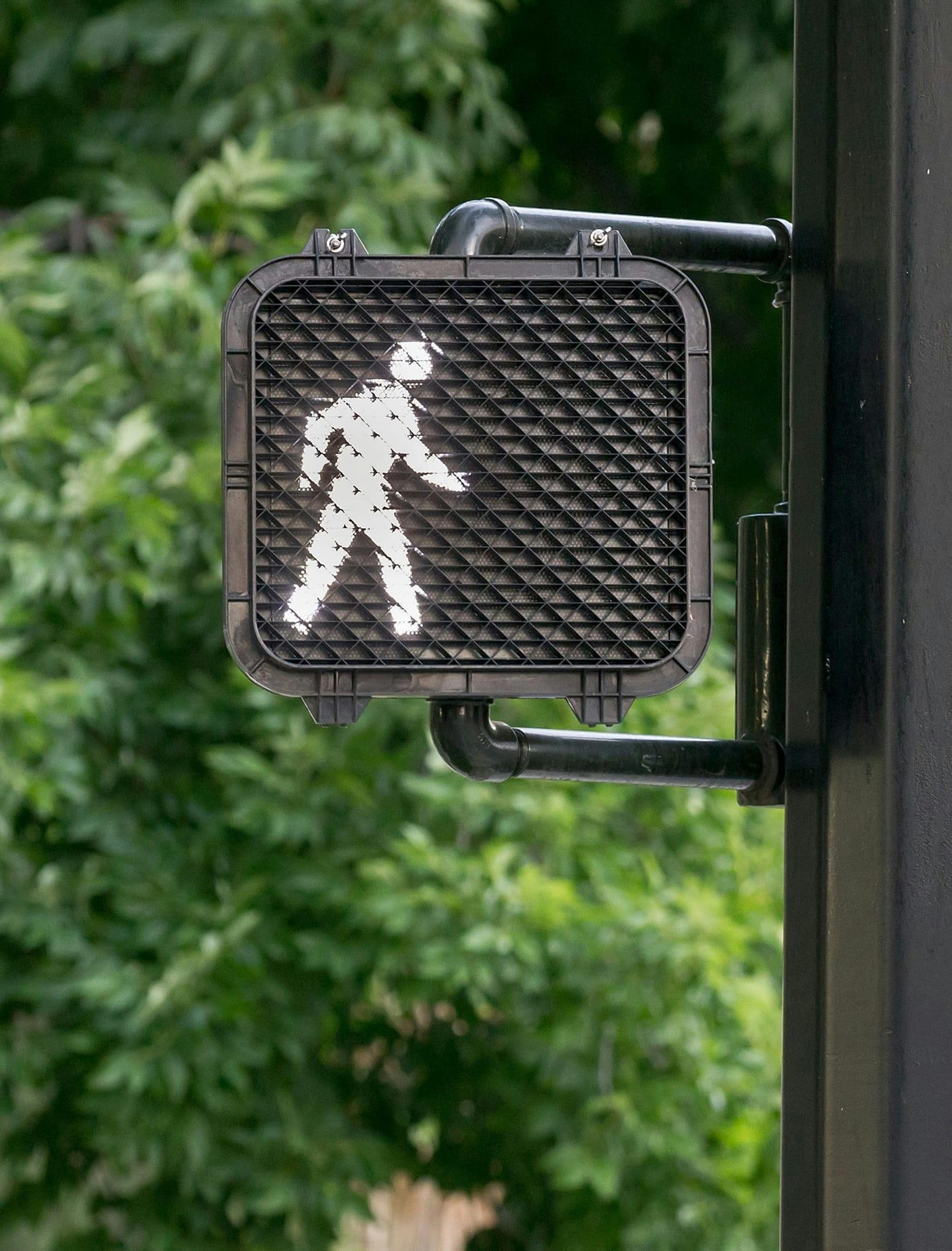 A walk sign on the street