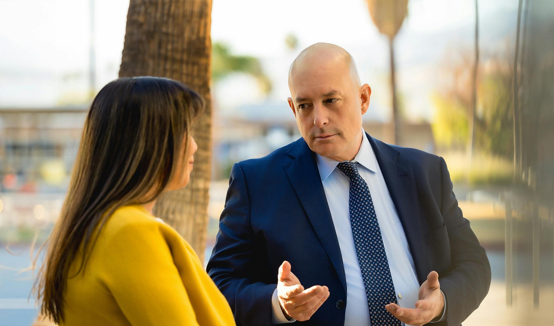 Chris speaking with client