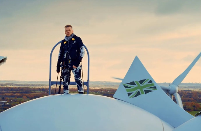 Dale Vince on a windmill