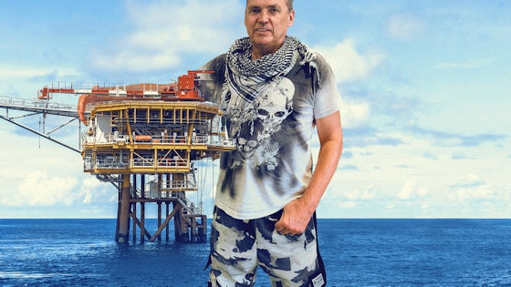 Dale giving an oil rig a hug