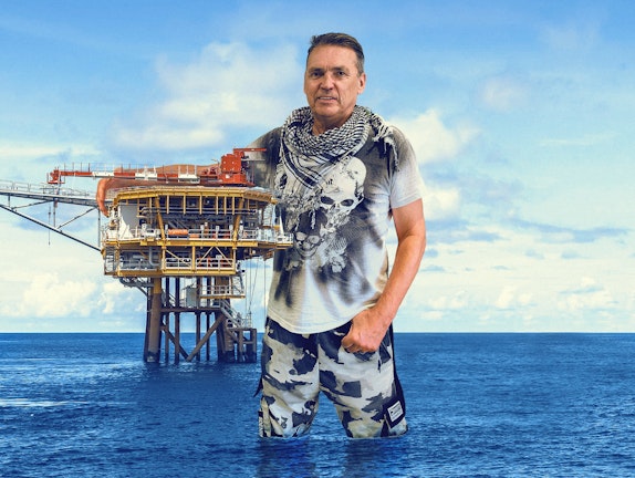Dale giving an oil rig a hug