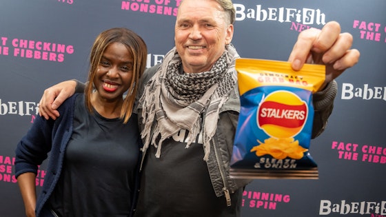 Dale Vince and June Sarpong with bag of crisps