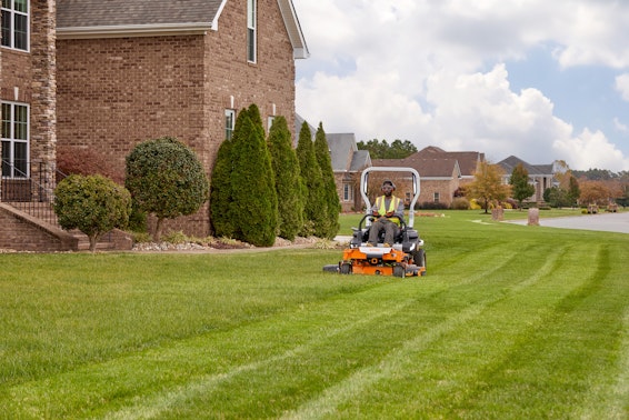 Man riding on STIHL zero turn mower