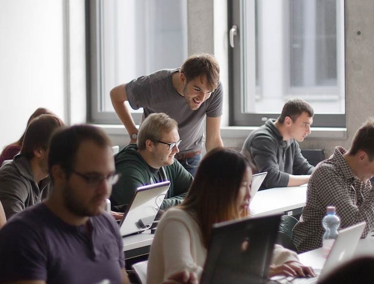 Group of software developers during a typescript workshop