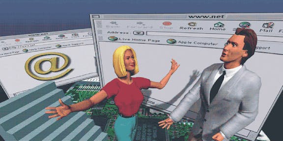 Two people presenting a website interface with email symbol and computer components displayed on screen