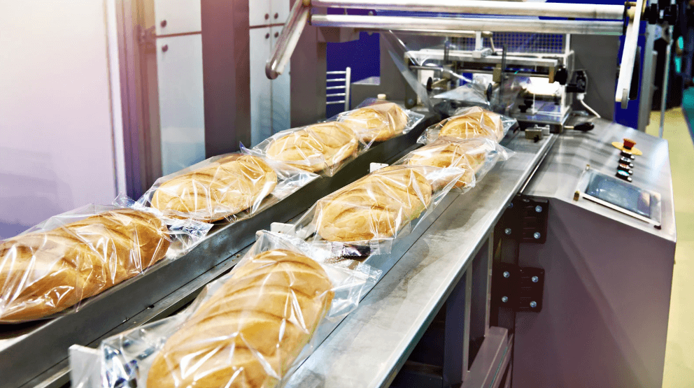 packaged bread on a conveyor belt