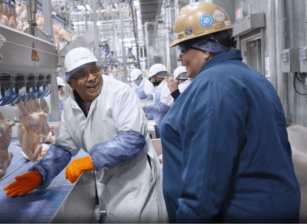 Operator and supervisor conversing on the plant floor