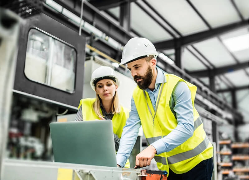 Manufacturing management looks at computer