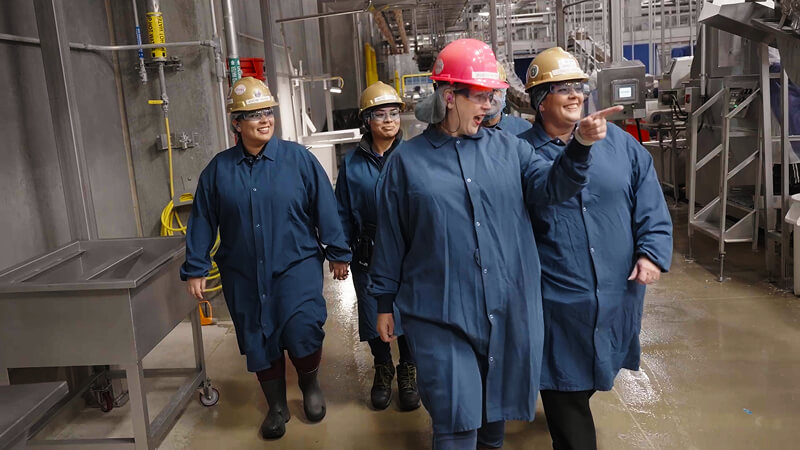 Lincoln Premium Poultry workers walking the plant floor
