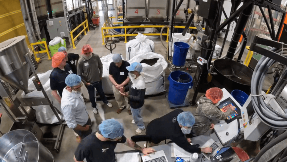 Death Wish Coffee employees working on the plant floor
