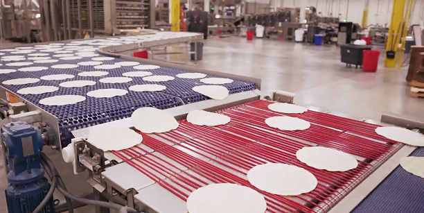 tortillas on a conveyor belt