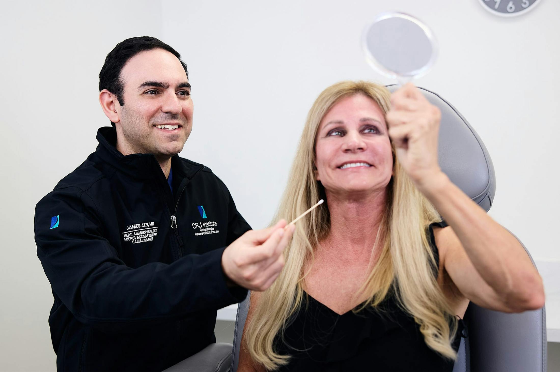 Dr. Azzi with patient
