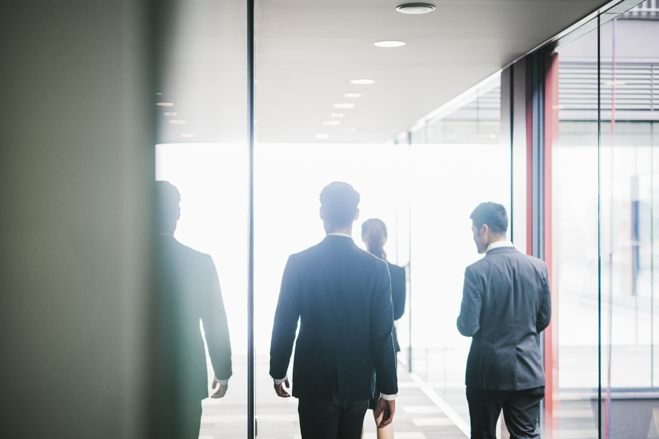 Men with their backs turned