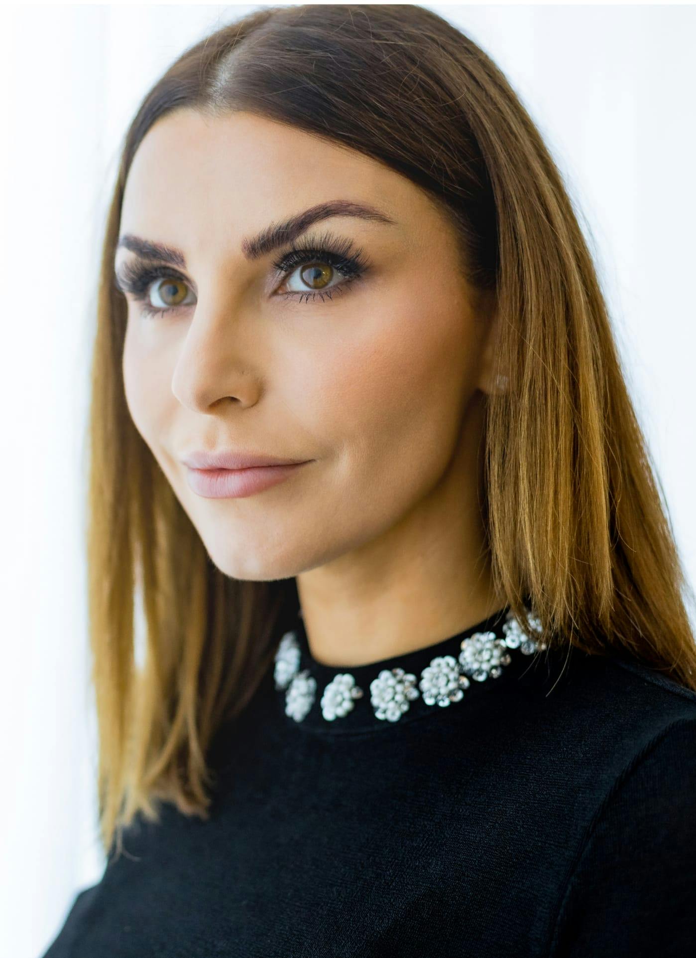 woman wearing a flower necklace